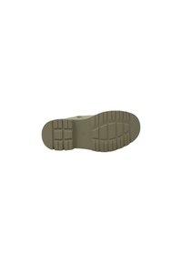 Suola delle scarpe progettata per la trazione, realizzata in materiale gommoso, con una superficie testurizzata caratterizzata da scanalature e creste di un colore beige tenue.
