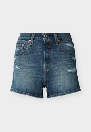 Zilas džinsa šorti ar nodilušām detaļām, priekšējā poga, jostas cilpas un priekšējās un aizmugurējās kabatas.