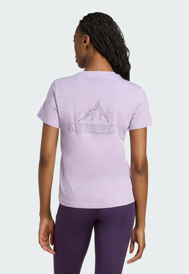 Lilac short-sleeve t-shirt with a geometric mountain design and "TERREX" text in black on the back. Smooth cotton texture.
