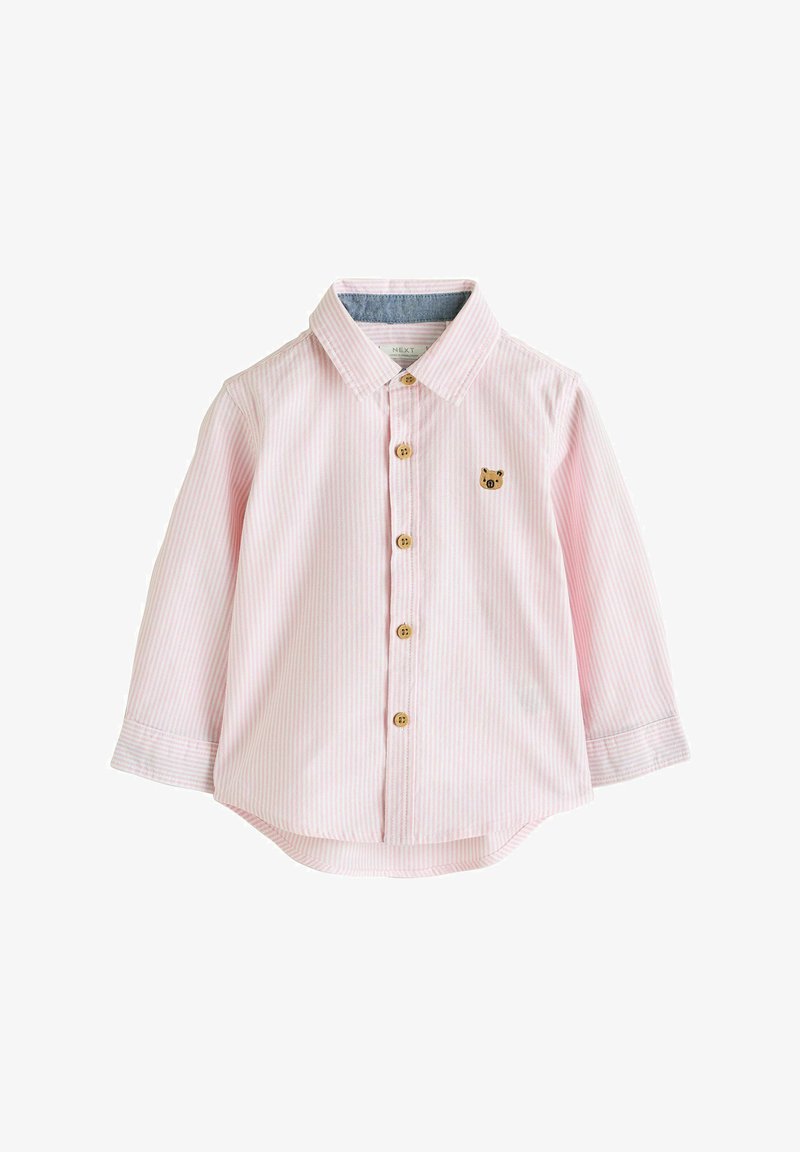 T-shirt pour tout-petit à manches longues rayé rose clair et blanc avec des boutons en bois et une petite broderie de visage d'ours brun sur la poitrine.