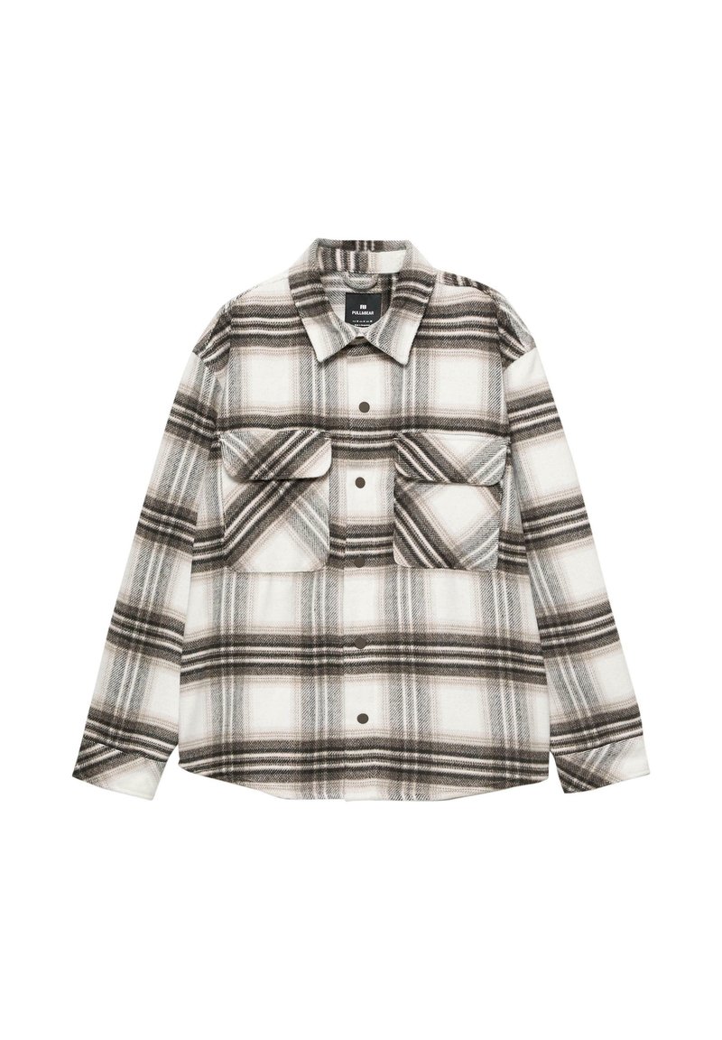 Koszula flanelowa w kratę w odcieniach bieli, czerni i szarości. Posiada dwie kieszenie na piersi i zapięcie na guziki z przodu. Miękka tekstura i luźny krój.