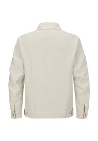 Helles beigefarbenes Leinenjackett, mit geknöpften Manschetten, Rückenkoller, seitlichen Schlitzen am Saum für Bewegungsfreiheit, mit einer glatten, strukturierten Oberfläche.