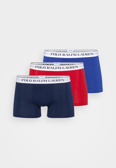 Tri pari bokseric v mornarsko modri, rdeči in modri barvi. Vsak ima črno-bež pas z napisom "POLO RALPH LAUREN".
