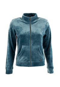 Giacca in velluto blu teal con zip, colletto alto, maniche lunghe, tasche frontali e zip in metallo.