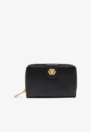 Black leather wallet with a textured surface, hexagon-shaped gold hardware, zip closure, and a side zipper for additional storage.