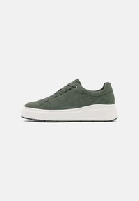 Green suede sneaker with a white platform sole, featuring round laces, simple stitching, and a rounded toe design.