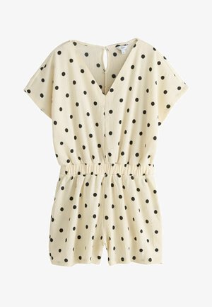 Cremerömer mit schwarzen Punkten, kurzen Ärmeln, V-Ausschnitt, elastischer Taille und Schlüsselloch-Knopfleiste auf der Rückseite.