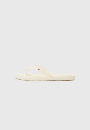 Yellow flip-flop sandal with a flat sole, featuring thin straps and a small decorative embellishment on the center strap. Smooth texture.