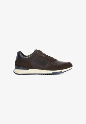 Dark brown sneakers made of leather and suede, featuring a rounded toe, contrasting sole, and lace-up design with eyelets.