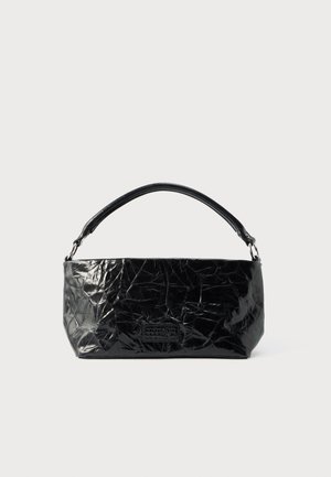 Small black patent leather handbag with short handle and a textured, crinkled surface on a plain background.