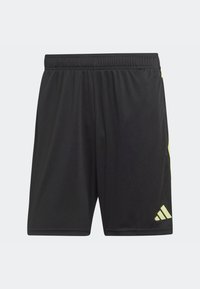Pantaloni atletici neri con un tessuto traspirante, cintura elastica e dettagli gialli, con un logo sul lato destro in basso.