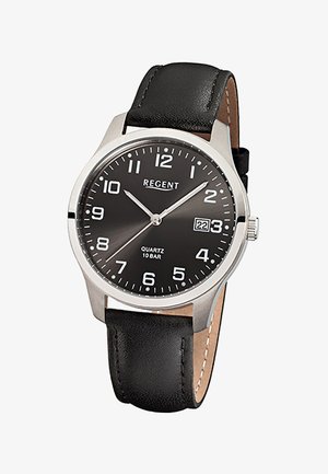 Montre-bracelet à cadran rond noir avec boîtier en argent, chiffres blancs, fenêtre de date à 3 heures et bracelet en cuir noir.