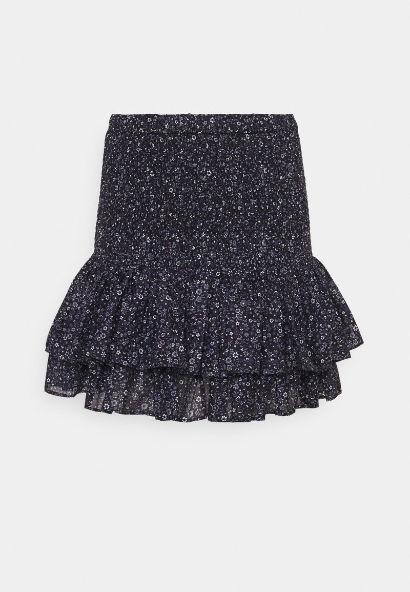 Mini-jupe fleurie bleu marine foncé avec taille smockée et ourlet à volants superposés sur fond uni.
