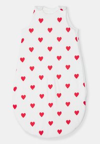 White sleeping bag with red heart patterns, rounded shape, soft fabric, sleeveless design, and snap closures at the shoulders.