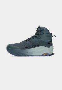 Botas de caminhadas masculinas com um design de cano alto, parte superior sintética cinza-azulada, painéis em malha e sola Vibram para melhor aderência. À prova d'água e duráveis.