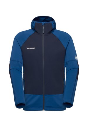 Veste à capuche zippée Mammut bleu et marine avec manches longues et logo sur la poitrine et le bras gauche.