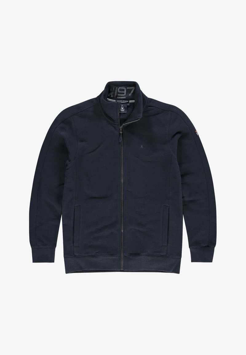Veste bleu marine à fermeture éclair complète avec col haut, manches longues, deux poches avant, et petit logo sur le côté gauche de la poitrine et la manche droite.