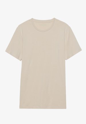 Ljusbeige kortärmad T-shirt i mjuk tyg; har en rund halsringning och en enkel design utan mönster eller accentuerade detaljer.