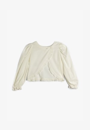 Blusa blanca de manga larga con mangas abullonadas, con un volante a lo largo del frente y detalles de botones en el escote. Textura de tela suave.