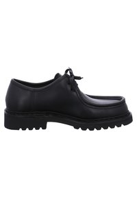 Chaussures en cuir noir à lacets avec un bout arrondi, une épaisse semelle en caoutchouc noir et des détails de couture le long de la tige. La texture est lisse et mate.