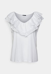 T-shirt blanc avec un large col en V. Présente des volants superposés autour de l'encolure. Fabriqué dans un tissu doux et lisse. Design simple.