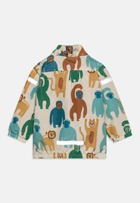 Veste beige pour enfants avec des illustrations d'animaux colorées et ludiques, incluant des lions, des singes et des ours, vue de dos avec des bandes réfléchissantes sur les manches.