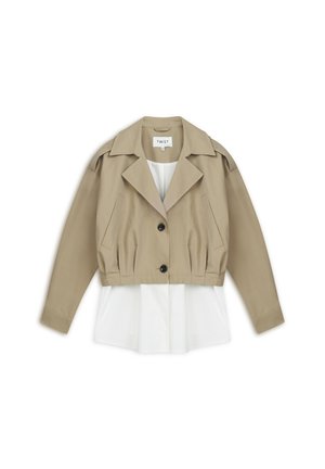 Beige Jacke mit gekürzter Länge, Knopfverschluss, schräge Taschen und einer weißen Innenschicht. Mit klassischem Kragen und strukturierten Schultern.
