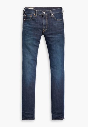 Mørkeblå denim jeans med lige ben, fem lommer, kontrastsying og en frontknaplukning.