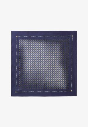 Foulard en soie navy présentant un motif en grille de petits carrés dorés et bleus, bordé par un contour navy uni avec un logo dans le coin inférieur droit.