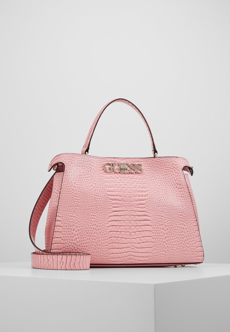 Borsa a tracolla rosa con texture e motivo coccodrillo, con doppi manici, accessori metallici dorati e tracolla regolabile. Logo visibile sul davanti.