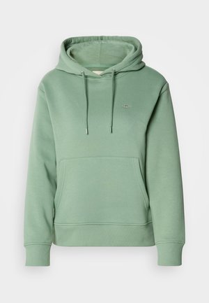Green cotton hoodie with a front pocket, drawstring hood, and ribbed cuffs. Features a small embroidered logo on the chest.