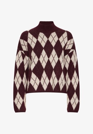 Burgundski pletenični pulover s kremnim argyle vzorcem, visokim ovratnikom in širokimi rokavi. Mehek material, skrajšana zasnova in rebrast rob.