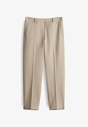 Pantalons beiges au texture lisse, dotés de deux poches latérales et d'une poche avant unique. Conception à jambe effilée avec des coutures décoratives à l'ourlet.