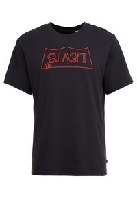 Camiseta de algodón negra con un gran logo rojo de Levi's impreso al revés. Con mangas cortas, cuello redondo y corte estándar.