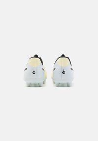 Nike Performance LEGEND 10 CLUB UNISEX - Scarpe da calcetto con tacchetti - lemonade/black/metallic gold coin