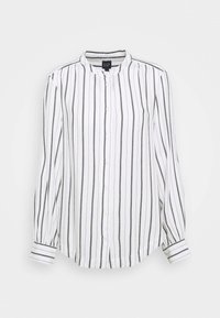 Camicia bianca con strisce verticali nere, colletto a banda, maniche lunghe, pattina e dettagli arricciati sulle spalle.