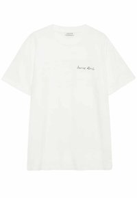 Hvid bomuld T-shirt med rund hals og korte ærmer, med et lille sort "ANINE BING" logo på venstre brystlomme.