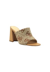 Sandalo con tacco alto e slide, con una tomaia intrecciata in crema e marrone caratterizzata da un motivo in rilievo. Il tacco è di forma squadrata e di colore beige. Design con punta aperta.