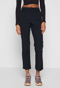 Czarne, lekkie, wodoodporne spodnie o prostym kroju. Posiadają zapięcie na guzik i zamek z boku oraz kieszenie boczne.