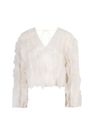 Witte verkorte blouse met een V-hals, met gelaagde ruches en een striksluiting op de rug. Gemaakt van lichte stof, met een zachte, gestructureerde afwerking.