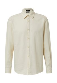 Camicia a maniche lunghe color crema. Presenta un colletto standard, chiusura con bottoni e texture liscia. Tessuto leggero con taglio dritto.