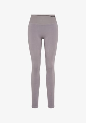 Light purple seamless athletic leggings with high waistband and subtle pattern details, featuring small brand logo on waistband.
