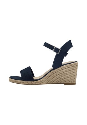 Sandales compensées en daim marine avec un talon en jute tressé, dotées d'une bride réglable à la cheville et d'un design à bout ouvert pour la respirabilité et le style.