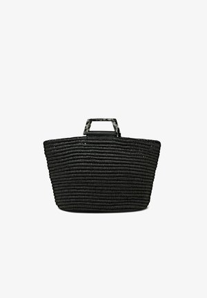 Bolso tote tejido negro con asa rectangular marmoleada en negro y gris, mostrado sobre un fondo blanco.