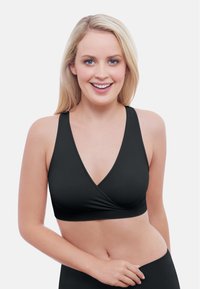 Schwarzer Wickel-Bralette mit tiefem V-Ausschnitt, aus glattem Stoff gefertigt, mit breiten Trägern und nahtlosem Design für optimalen Komfort.
