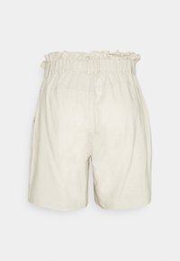 Beige Hochbund-Shorts mit rüschigem elastischem Bund und seitlichen Taschen, lockere Passform, leichtes Material.