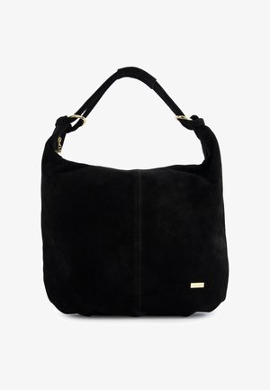 Sac hobo en daim noir avec une bandoulière nouée, arborant un discret logo doré et une texture lisse, silhouette structurée.