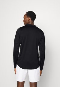 Nike Performance M NKCT DF ADVTG TOP HZ - Pikkade varrukatega topp - black/white