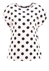 Kortärmad topp i ljusrosa tyg med svarta prickar. Har en liten bröstficka och en lös, avslappnad passform.