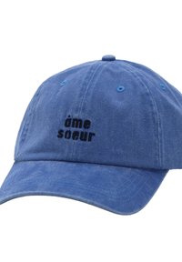 Blue cotton baseball cap with a curved brim and embroidered "âme sœur" in black. Features ventilation eyelets and a soft texture.